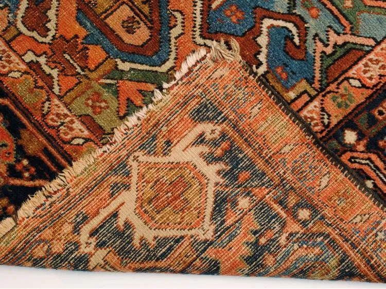 HAND WOVEN HERIZ ROOM RUG.